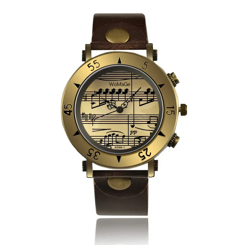 Vintage wristwatch with brass finish and brown leather strap featuring a musical score dial