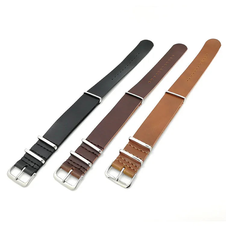 Set of three leather watch straps in black, dark brown, and tan with silver buckles