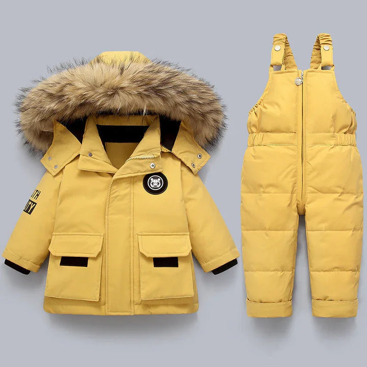 Yellow toddler winter jacket with fur hood and matching insulated snow bib pants