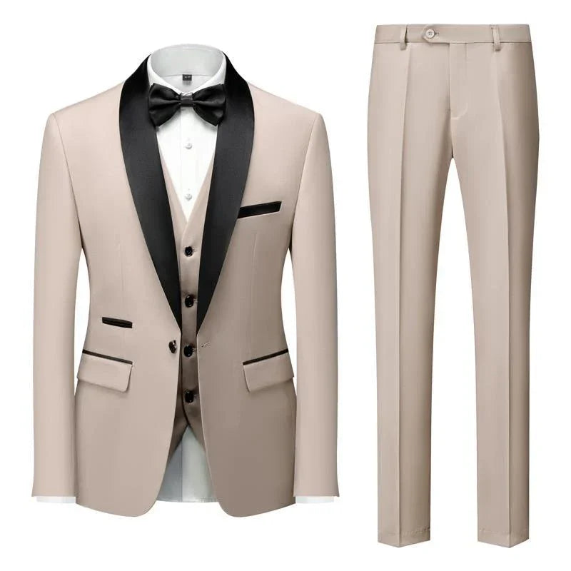 Beige tuxedo suit with black satin shawl lapel, matching vest, white shirt, black bow tie, and beige trousers