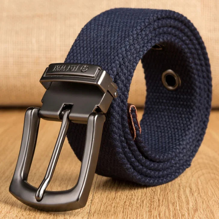 Navy blue woven fabric belt with black metal buckle placed on wooden surface