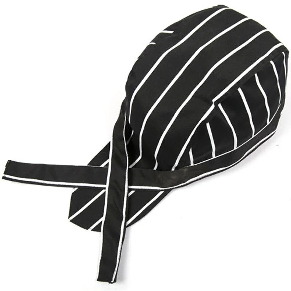 Black chef skull cap with white vertical stripes and attached ties on white background
