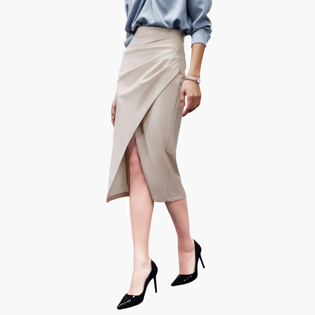 Woman wearing beige wrap pencil skirt paired with black high heels and light blue blouse