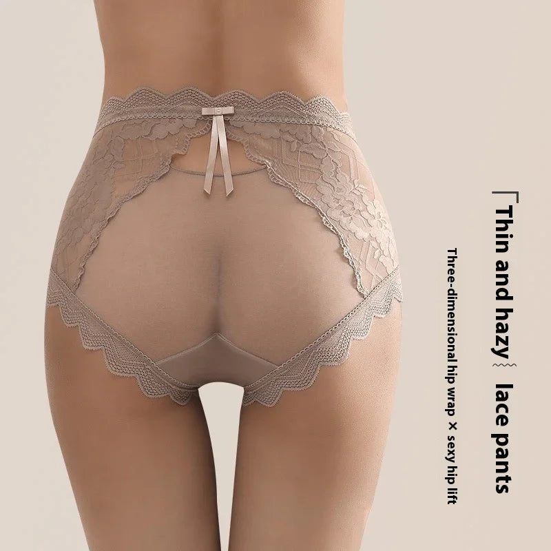 Back view of beige thin and hazy lace panties with scalloped edges and a small ribbon bow
