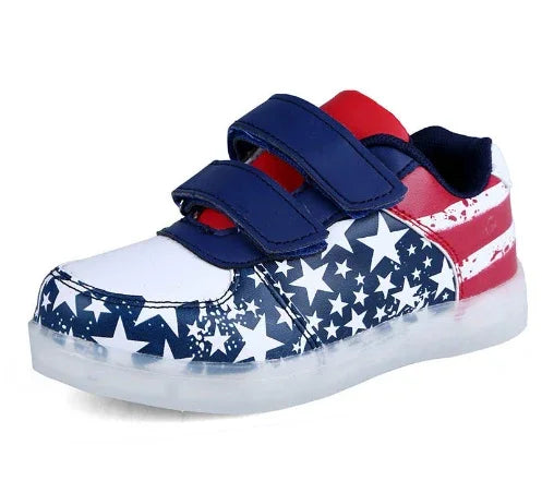 Kids sneaker with USA flag design, stars and stripes, blue velcro straps, clear sole