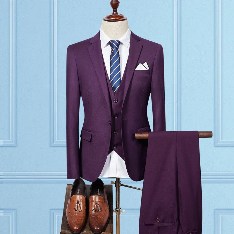 Purple men's three-piece suit with white shirt, blue striped tie, pocket square, and brown tassel loafers
