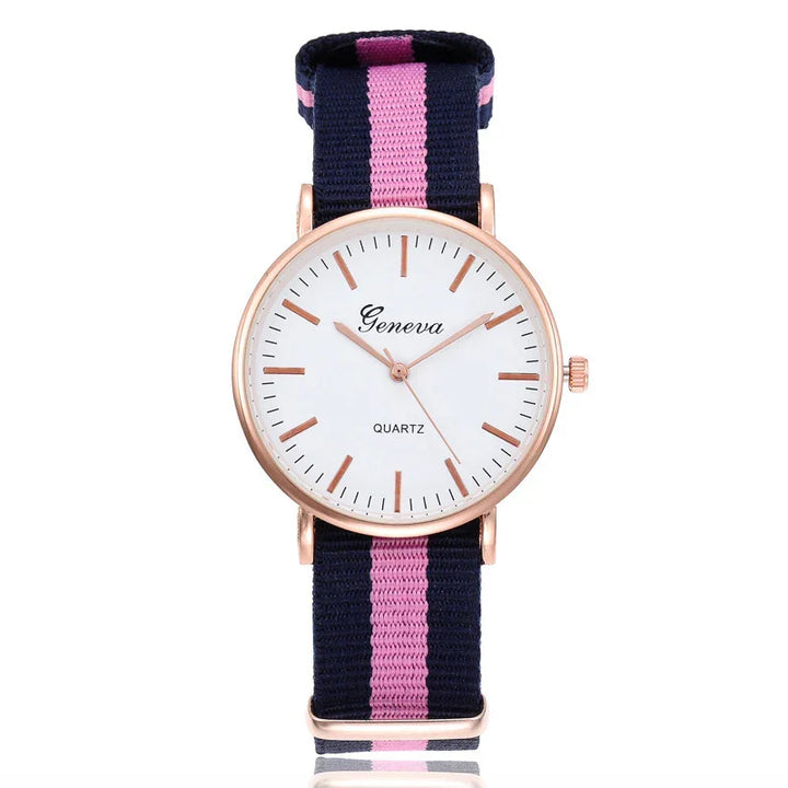 Geneva quartz wristwatch with rose gold case and navy blue and pink striped fabric strap