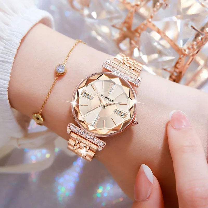 Elegant Kabean rose gold wristwatch with crystal accents on wrist, paired with delicate gold bracelet