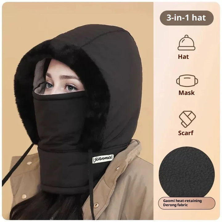 Woman wearing black 3-in-1 hat with hood, mask, and scarf made of heat-retaining fabric