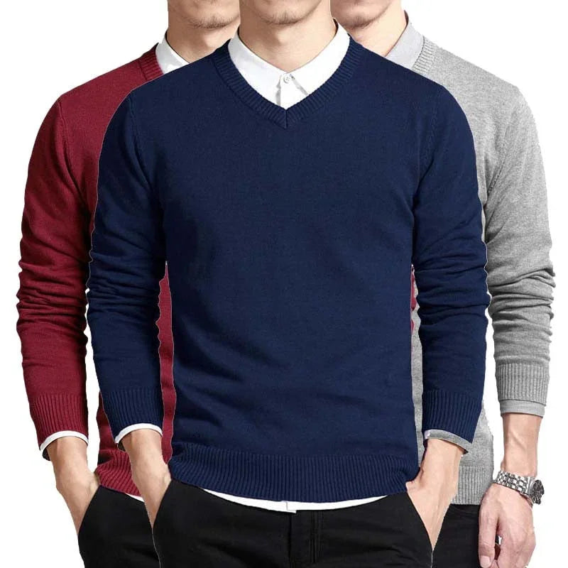 Men's V-neck sweaters in navy blue, burgundy, and gray, styled with white shirts and black pants