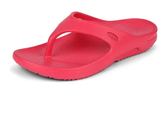 Red lightweight rubber flip-flop sandal with textured footbed and open toe design