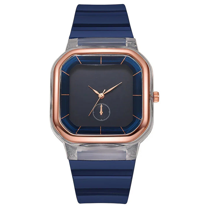 Square wristwatch with rose gold bezel, blue dial, rose gold hands, and blue silicone strap