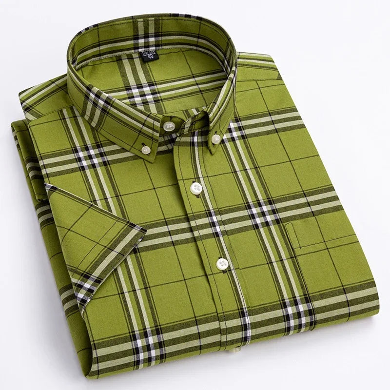 Folded green plaid short sleeve button-down shirt with pocket on white background