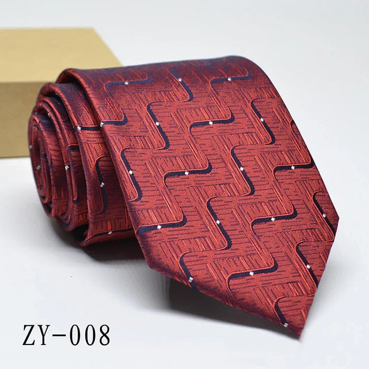 Red silk necktie with geometric zigzag and dot pattern, model ZY-008 on white background