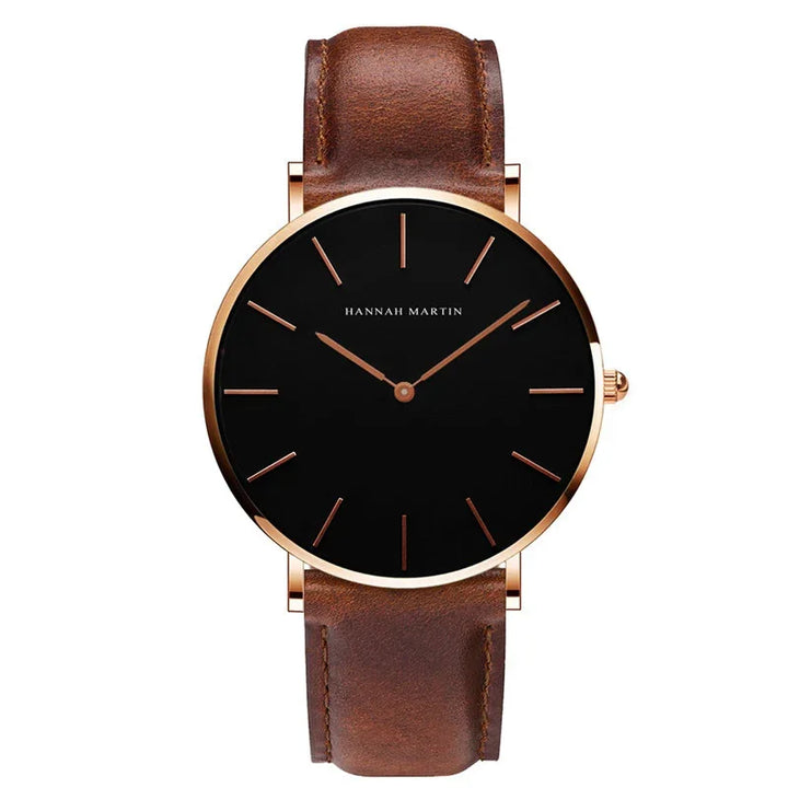 Minimalist Hannah Martin wristwatch with black dial, rose gold case, and brown leather strap