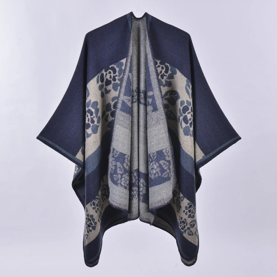Navy blue and beige floral patterned wool poncho with open front and stitched edges