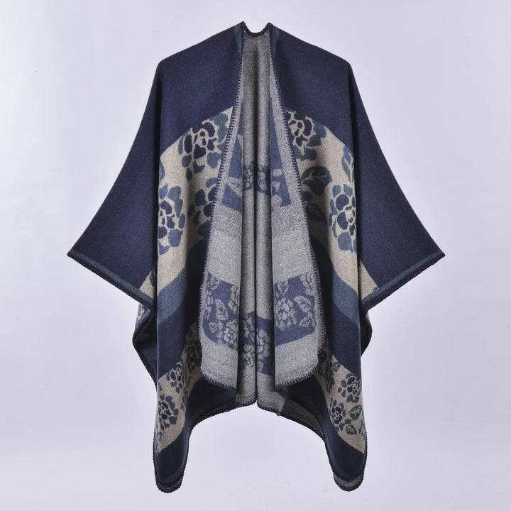 Navy blue and beige floral patterned wool poncho with open front and stitched edges