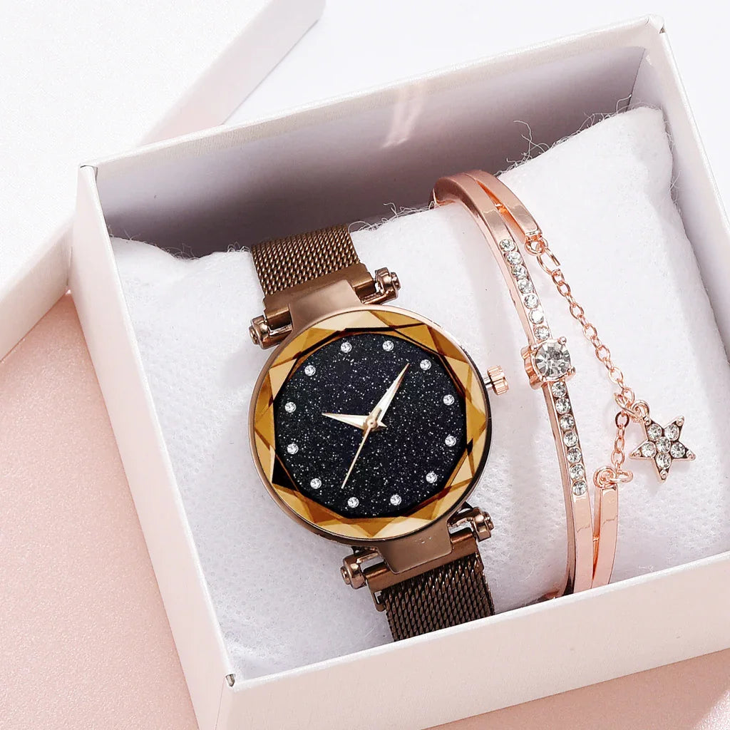 Women’s luxury watch with black glitter dial and rose gold bracelet with star charm in white gift box