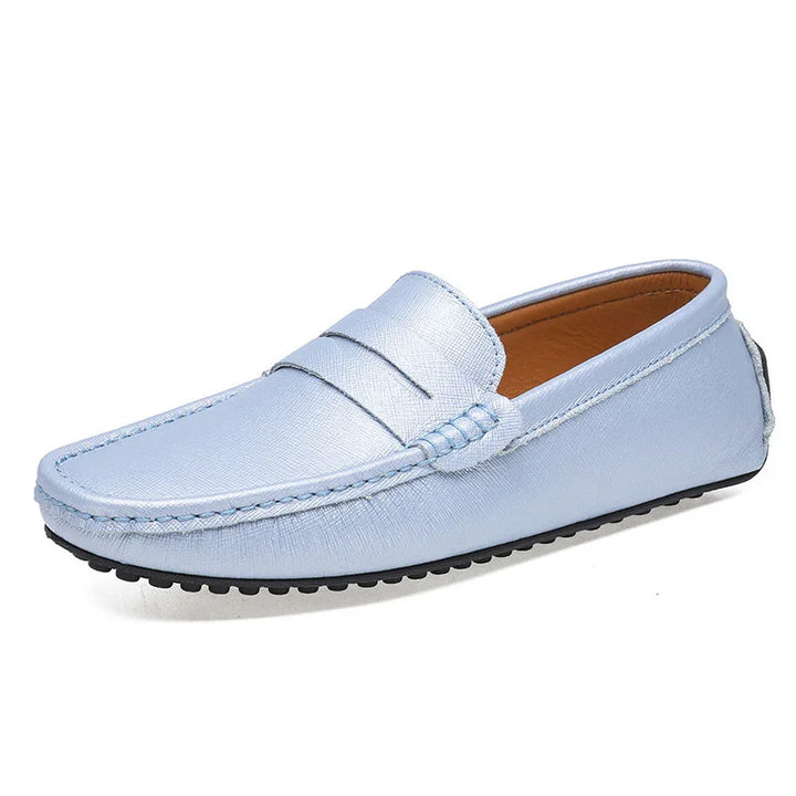 Light blue leather men's driving loafer with black rubber sole and stitched detailing