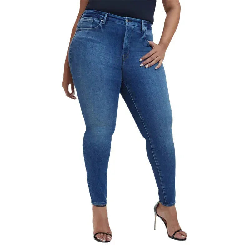 Plus size woman wearing high-waisted blue skinny jeans and black high heel sandals