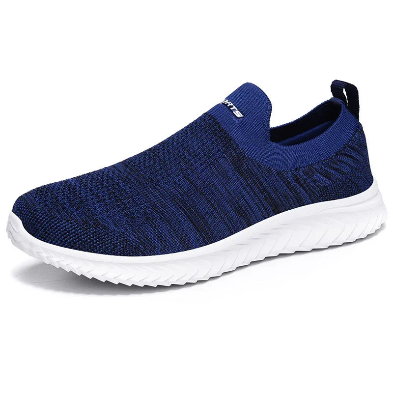 Slip-on navy blue knit athletic shoe with white flexible sole and pull tab heel
