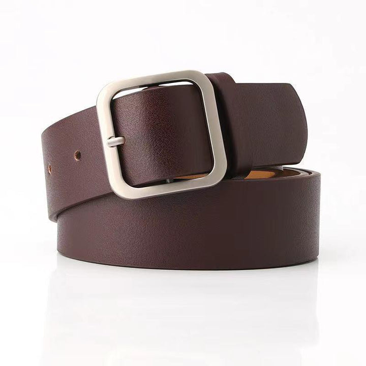 Brown leather belt with large square silver buckle on white background