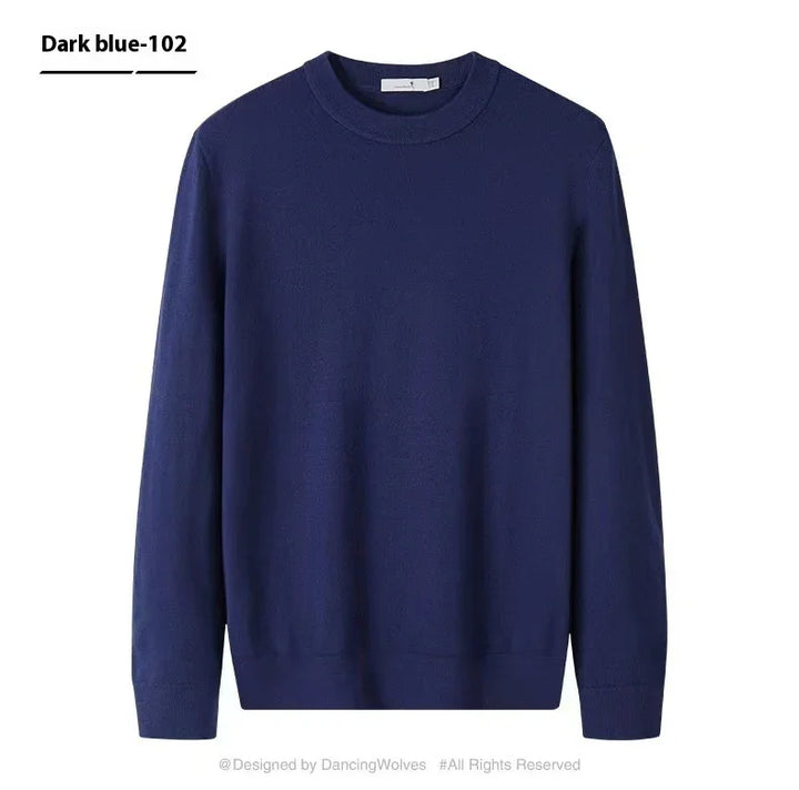 Dark blue crew neck sweater with long sleeves and ribbed cuffs, classic knitwear style