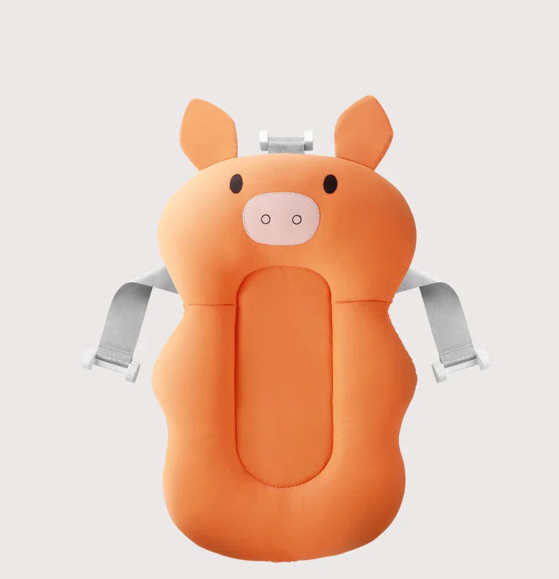 Orange pig-shaped baby bath cushion with gray safety straps on white background