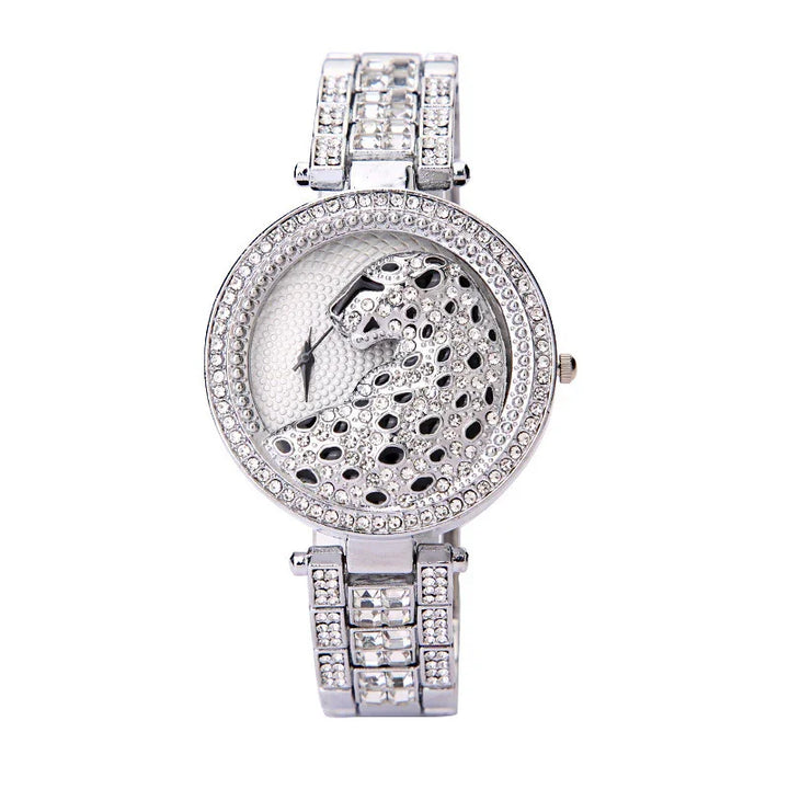 Luxury silver wristwatch with crystal-encrusted leopard design and rhinestone-studded band