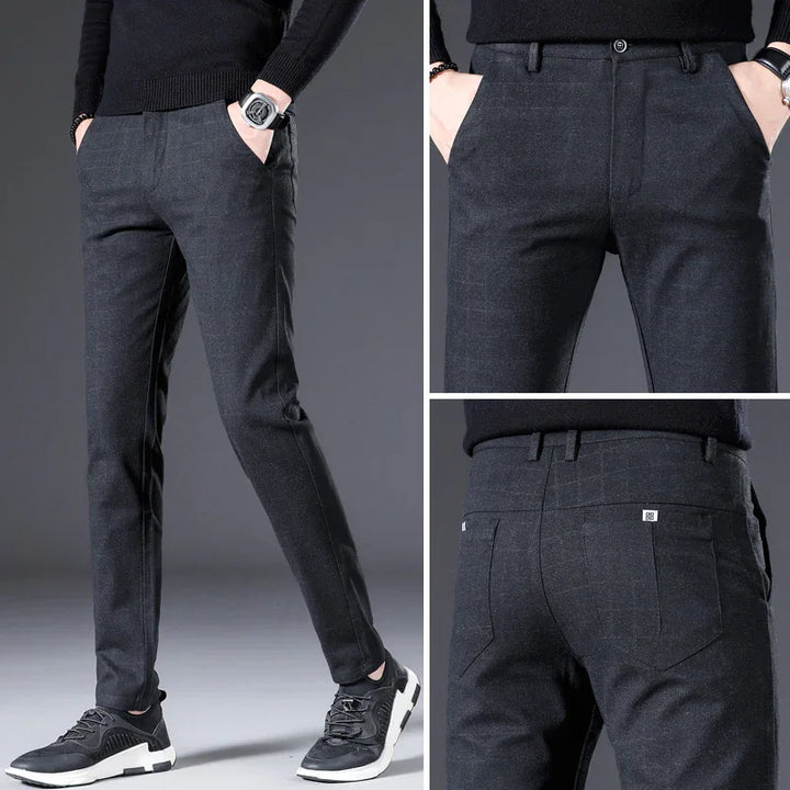 Men's dark gray slim fit casual pants styled with black sneakers and black sweater, front and back views