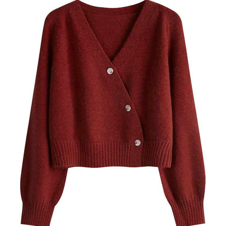 rust red V-neck buttoned wool cardigan sweater with ribbed hem and cuffs
