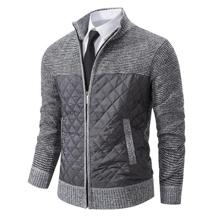 Men's gray quilted and knitted zip-up jacket with white shirt and black tie on mannequin