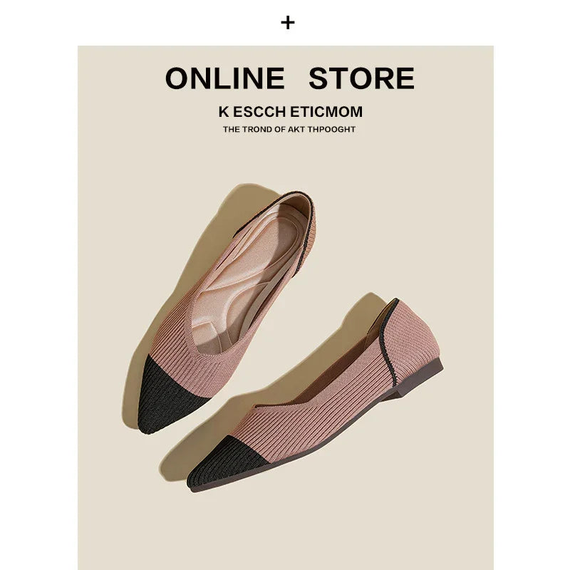 Pair of stylish pink and black pointed toe flat shoes displayed on beige background