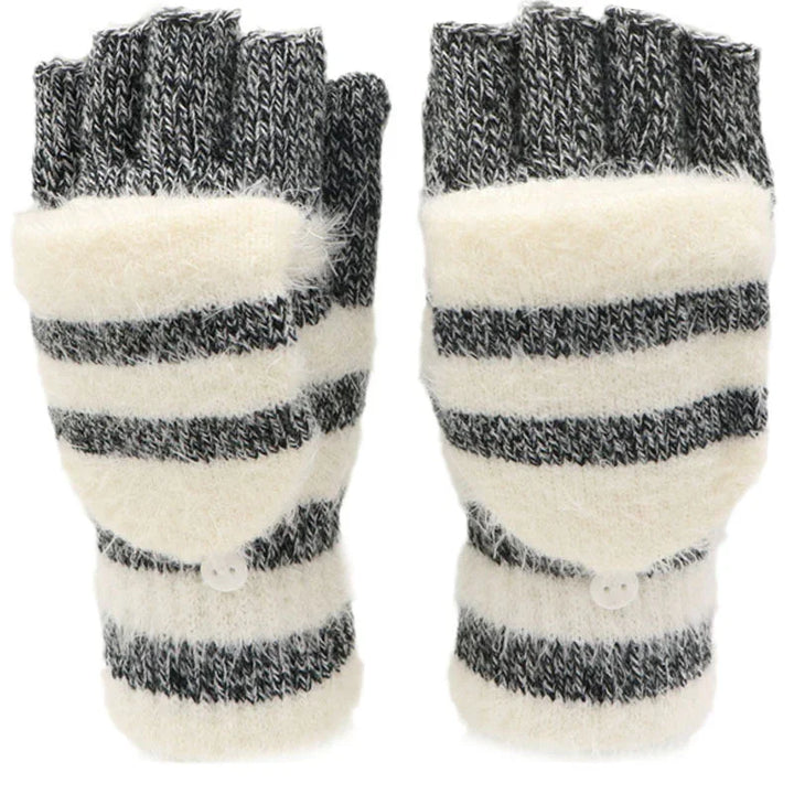 Black and white striped knit convertible fingerless gloves with fold-over mitten flaps and button closure