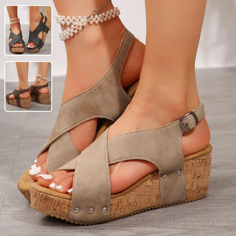 Women's wedge sandals with cork soles and suede crisscross straps in taupe, black, and brown colors