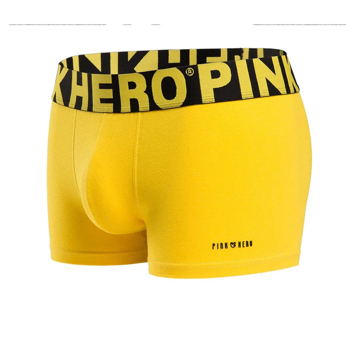 Bright yellow men's boxer briefs with black waistband featuring PINK HERO branding