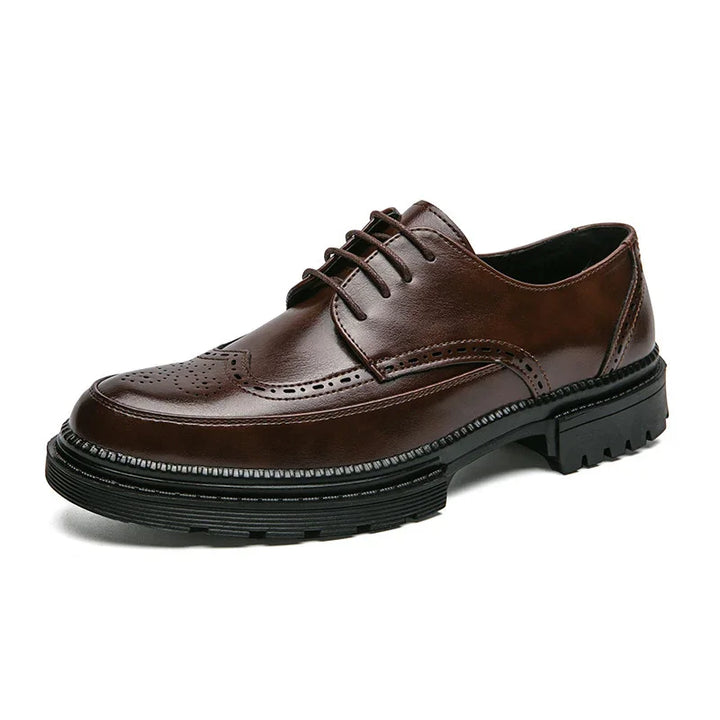 brown leather men's brogue shoe with black chunky rubber sole and lace-up design