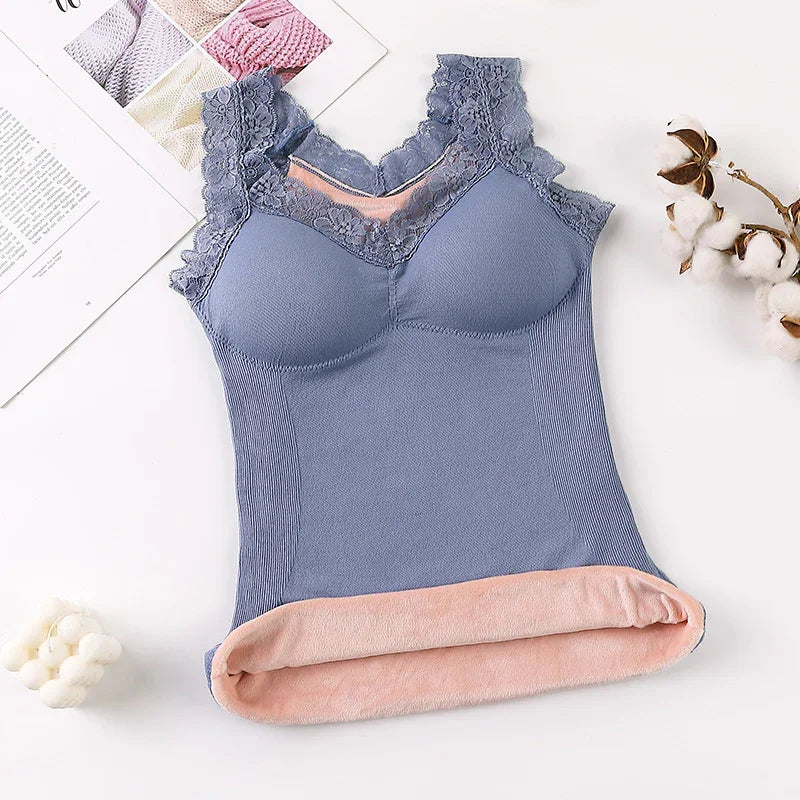 Blue lace-trimmed thermal camisole with padded cups and pink fleece lining on white background