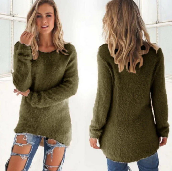 Woman wearing olive green fuzzy sweater with long sleeves paired with ripped blue jeans, front and back view