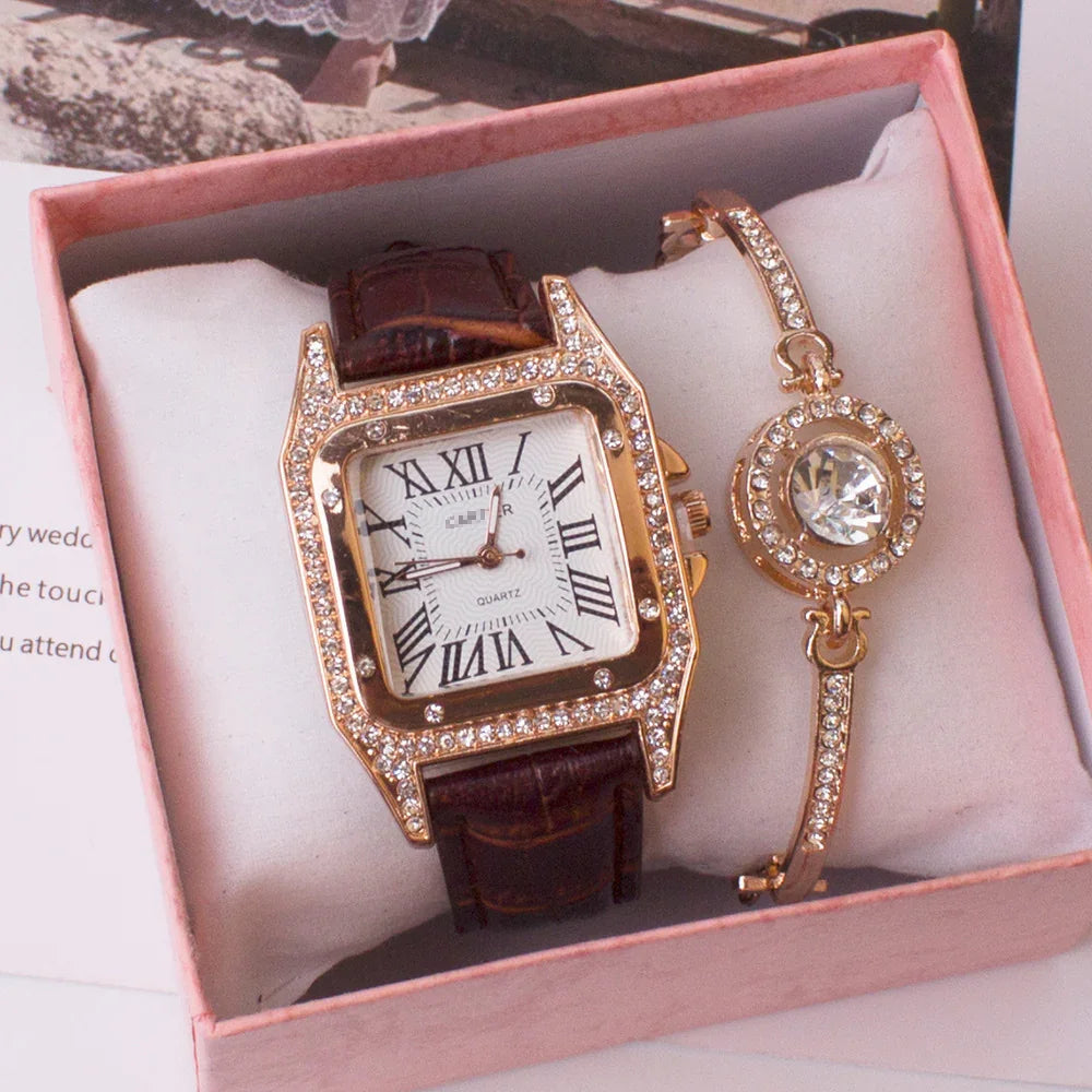 Elegant gold and rhinestone women's watch with brown leather strap and matching rhinestone bracelet in pink gift box