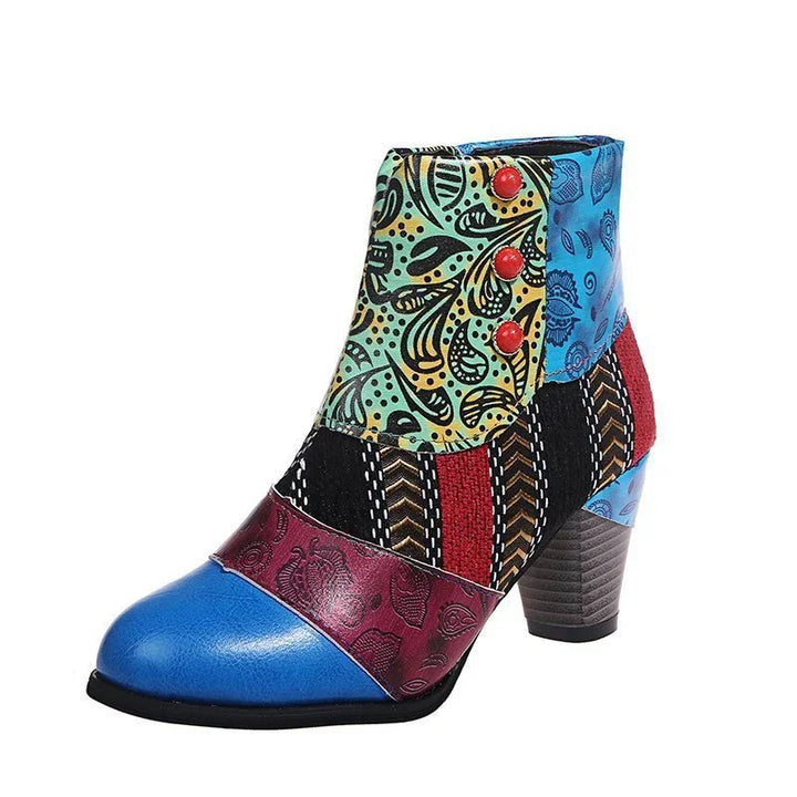 Colorful patchwork ankle boot with floral and geometric patterns, red buttons, and stacked heel