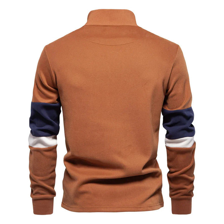 Back view of brown long-sleeve shirt with navy and white stripes on sleeves