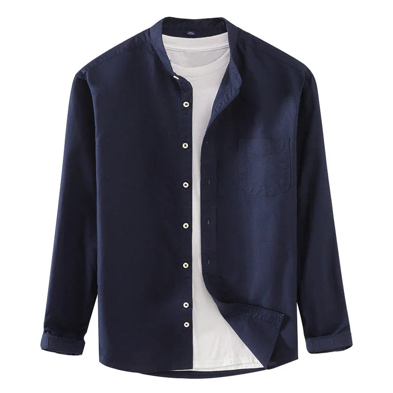 navy blue mandarin collar shirt over white t-shirt with button-down front and chest pocket