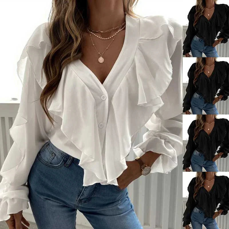 Women wearing ruffled V-neck blouses in white and black with long puff sleeves paired with blue jeans