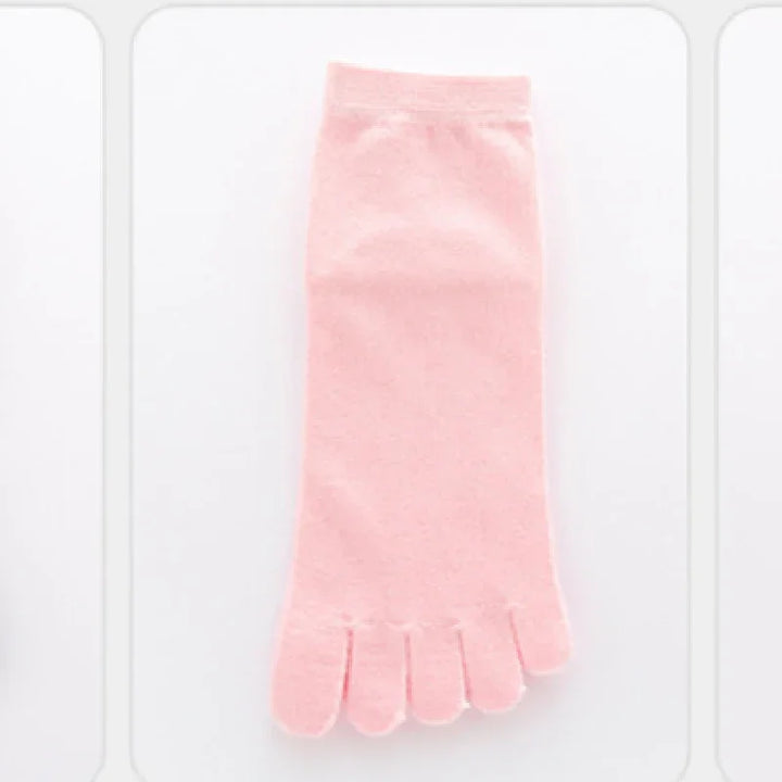 Soft pink toe socks displayed on white background, comfortable cotton blend footwear