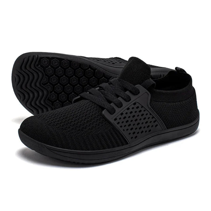 Black lightweight breathable knit sneakers with rubber soles and lace-up design
