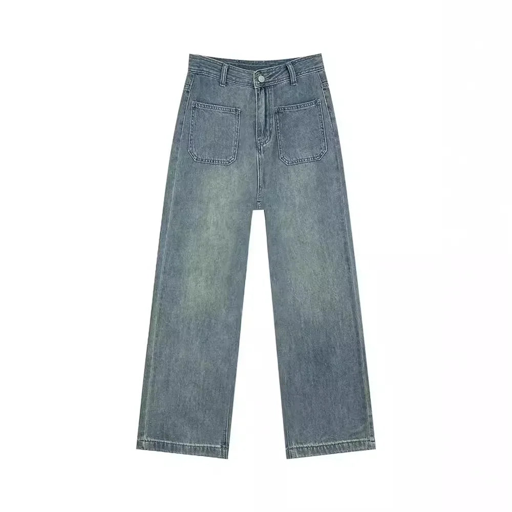 Wide-leg faded blue denim jeans with front patch pockets and button closure