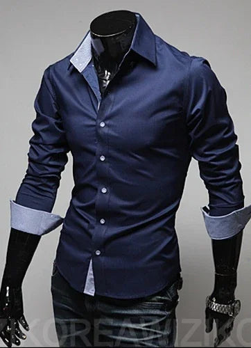 Slim-fit navy blue men's dress shirt with contrasting light blue cuffs on black mannequin