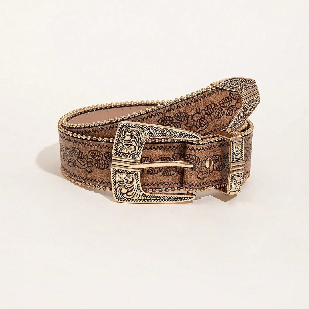 Brown leather belt with floral pattern and ornate engraved gold buckle and studs