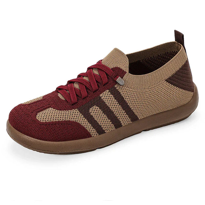 Brown and maroon knit sneaker with lace-up front and flexible sole on white background